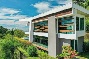 Luxurious villa with infinity pool view and Roof top stargazing in Costa Rica - VILLA #9 DE LOS PÁJAROS